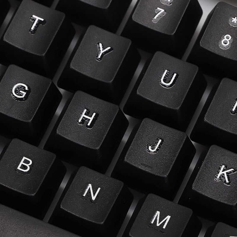 Angled view of the wired keyboard, highlighting its full-size layout and ergonomic key placement.
