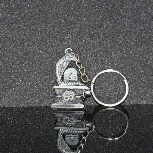 Elegant Shivling keychain with snake design in silver metal