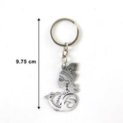 Close-up of Krishna face pendant keychain