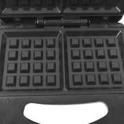 Close-up of the cool-touch handle and indicator lights on the Dabster sandwich maker.