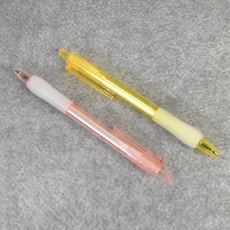 A pair of CustoPen ballpoint pens displayed with essential office stationery.