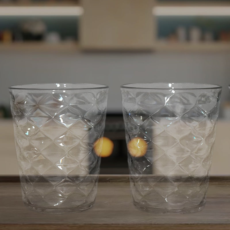 Side view of pyramid plastic glass showcasing wide stable base