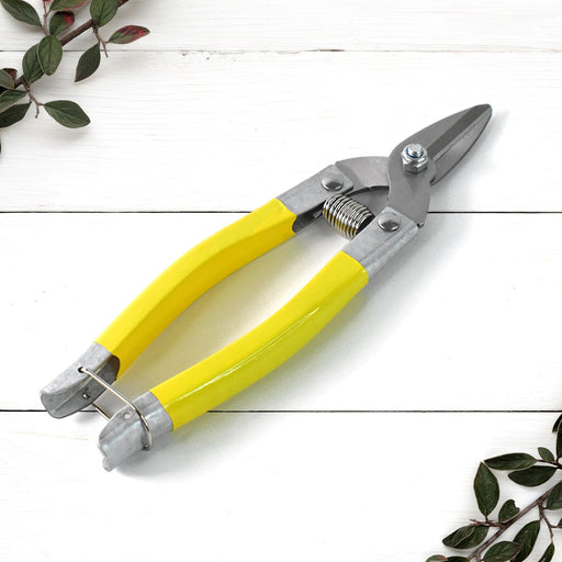 Close-up of precision micro garden snip pruning scissor with ergonomic grips