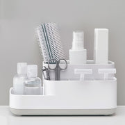 Close-up view of the versatile compartments of the plastic desk organizer.