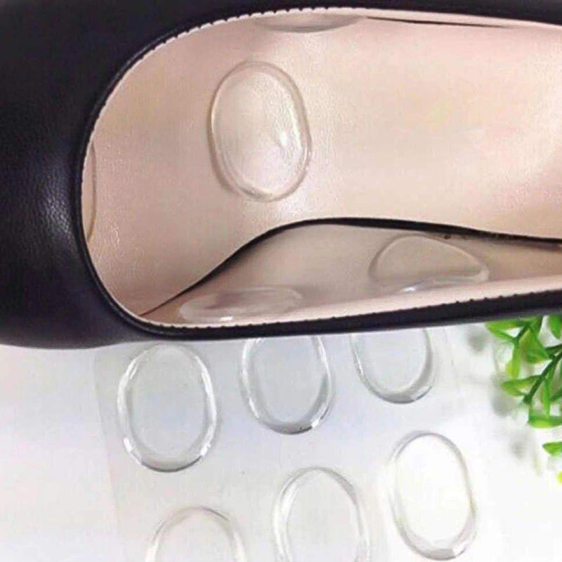 Textured surface of silicone heel pad designed to reduce foot pain