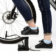 Manual foot air pump with hose and nozzle attachments