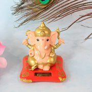 Side profile view revealing intricate craftsmanship of medium Lord Ganesha figurine