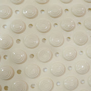 Flexible anti-slip bath mat folded to show versatility and easy storage