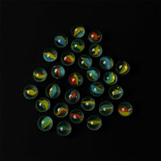 Glass marbles displayed with colorful swirl designs, ideal for kids and crafts