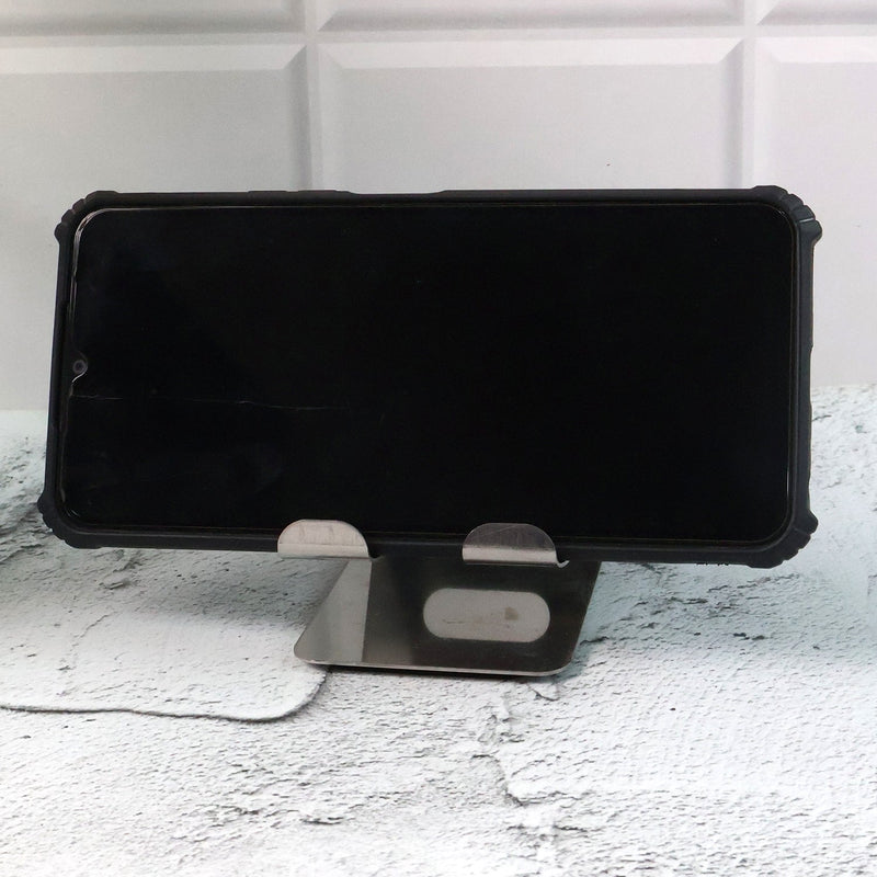 Generic image showing mobile and tablet stand holder in use