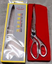 Top-down view of Cisora's gold-plated cloth cutting scissors, highlighting precision.