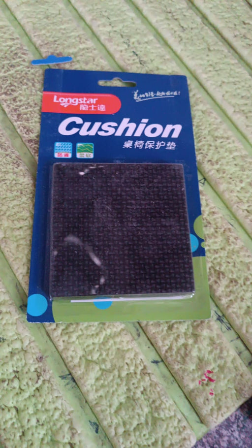 Assorted sizes of round and square felt furniture protection pads on a clean surface.