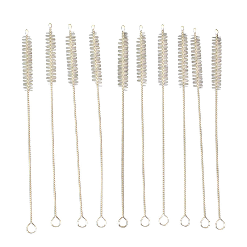 Nylon bristles cleaning a reusable metal straw with the brush from the set