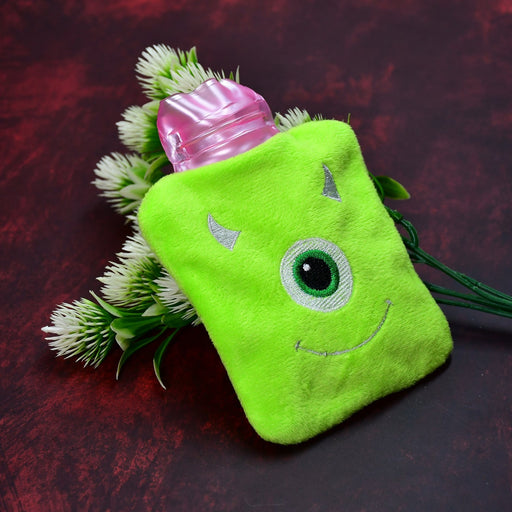 Green monster print hot water bag with a soft cover for pain relief.