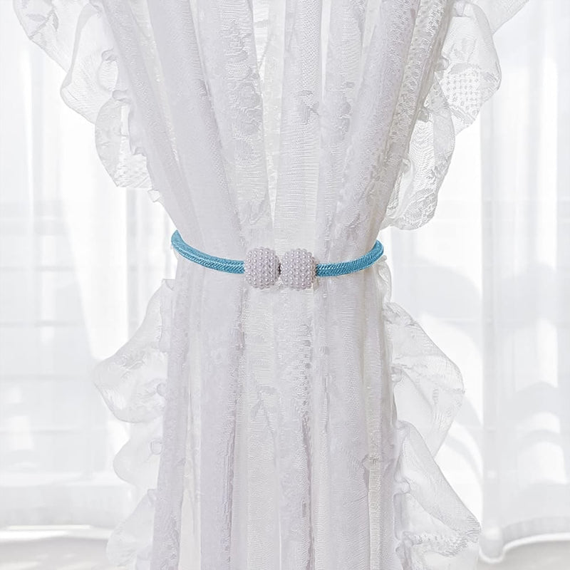 Set of two magnetic curtain tiebacks featuring pearl accents