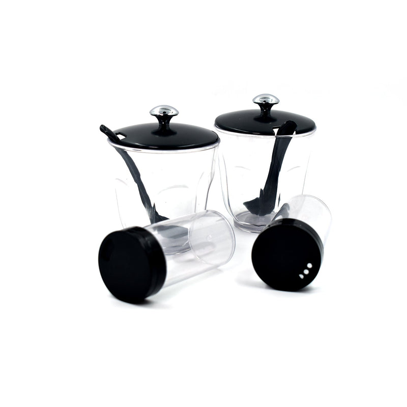 An Indian kitchen countertop featuring the Ganesh Spice Condiment Set for daily cooking.