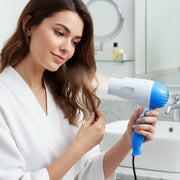 Dual speed hair dryer with ergonomic grip