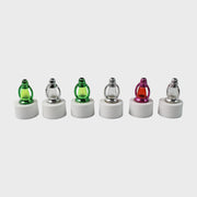 Battery-operated LED candle lights with decorative lantern-style covers