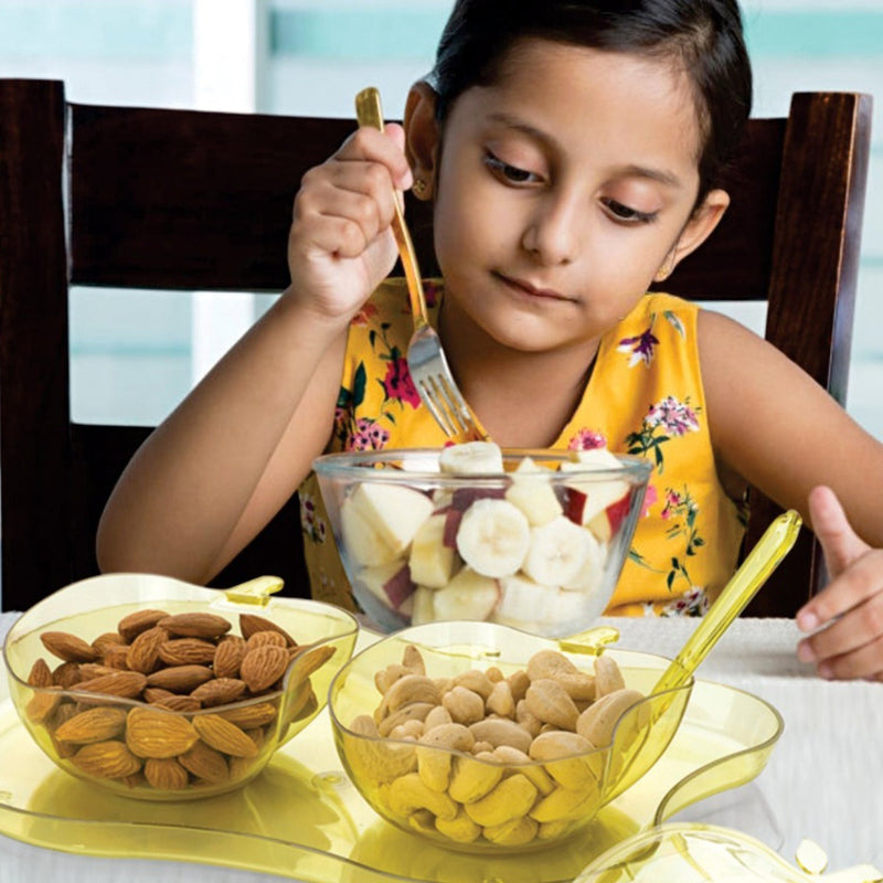 The complete apple shape serving set with all components neatly arranged.