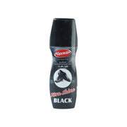 Close-up of liquid black shoe polish being applied to a shoe