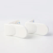 Childproof lock securing cabinet doors from toddlers