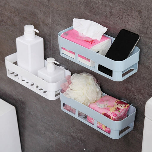 ABS plastic shower corner caddy with strong suction cup on tiled wall.
