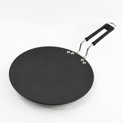 Close-up of the heat-resistant handle on non-stick tawa