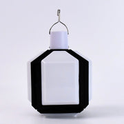 Portable camping LED light shown folded for easy travel and storage