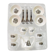 Detailed shot of the miniature plastic serving tray and tea pot.