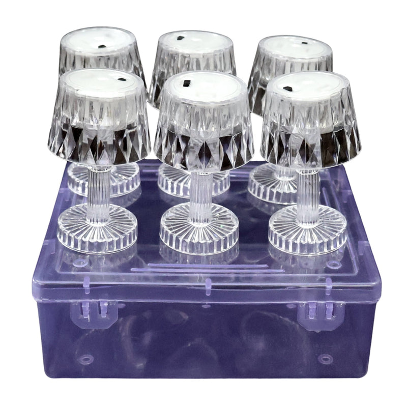 Portable LED mini table lamps providing flameless, flickering ambient illumination.
