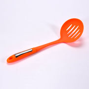 A 35cm cooking shovel expertly filtering soup, highlighting its straining capabilities.