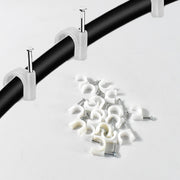 Strong hold plastic cable clip attached firmly to wooden surface