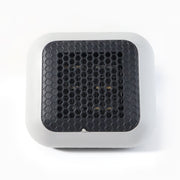 Small room warmed by the compact 600W plug-in wall-mounted room heater