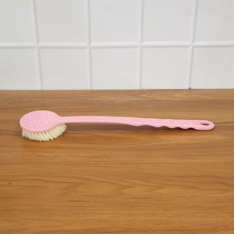 Velvet Wipe back scrubber demonstrating its extended handle for full back coverage during bathing.