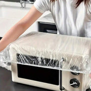 Elasticated plastic couch protector securely fitted over a sofa.