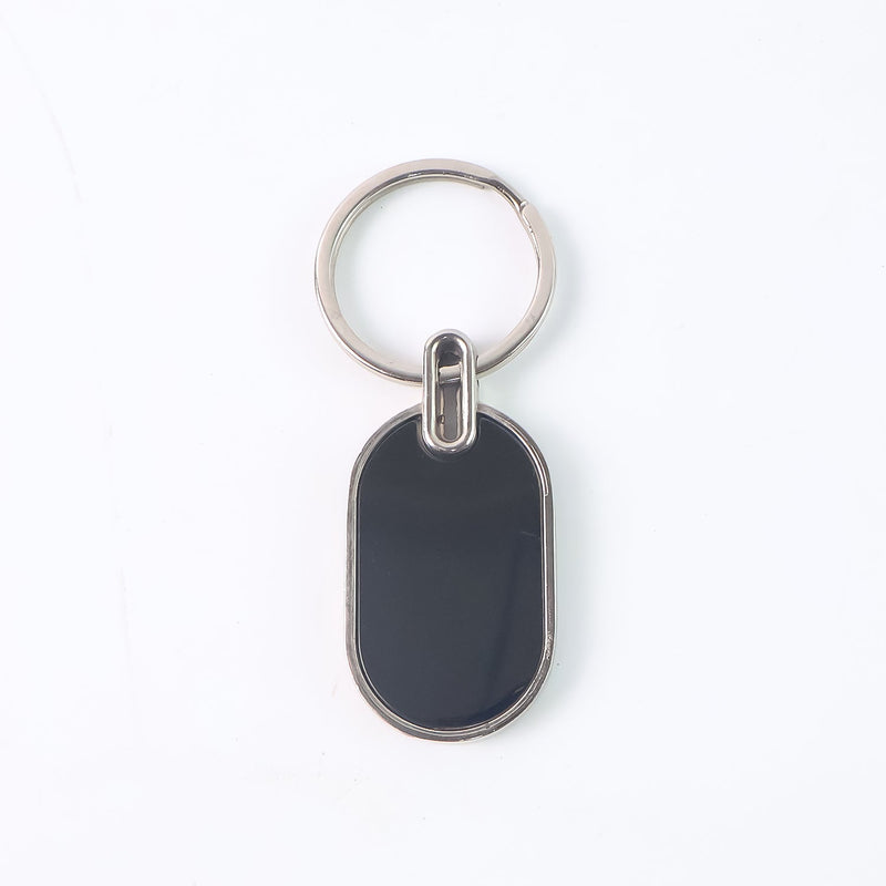 Monogram edge silver and black oval metal key holder accessory