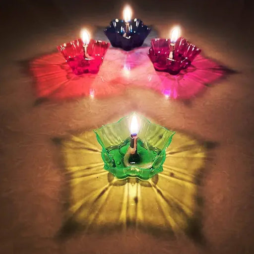 Colourful Reflection Diya Set with multi-shaped plastic candle cups arranged for Diwali decoration.