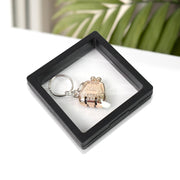 Nail clipper with unique floating keychain frame for easy portability