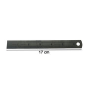 Close-up showing detailed markings on steel measuring ruler