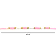 Pink & White Thread Rakhi on a hand