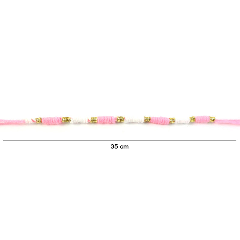 Pink & White Thread Rakhi on a hand