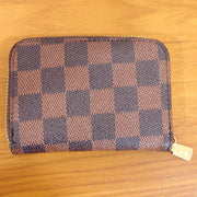 Side angle of zip card holder wallet showing design