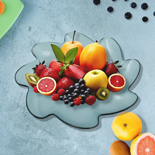 A vibrant orange flower shaped kids plastic plate displayed on a clean white surface.