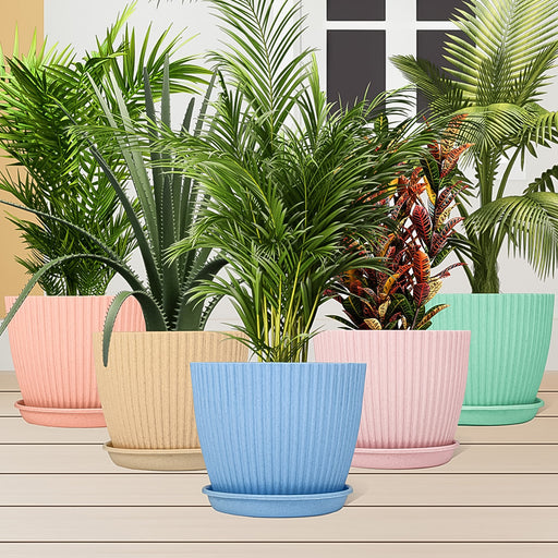 Single round plastic flower pot with a matching drainage tray, showcasing its modern design.