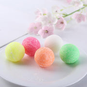 Wonder Fresh Urinal Balls in assorted colors for long-lasting freshness.