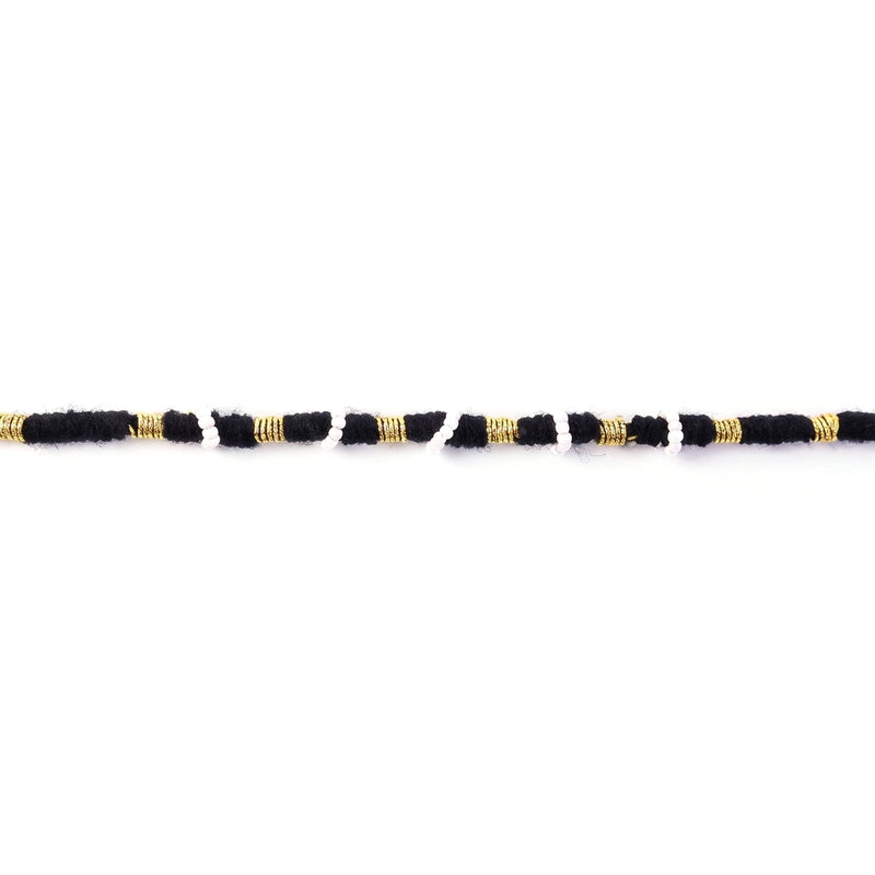 Traditional ethnic black and white beaded rakhi