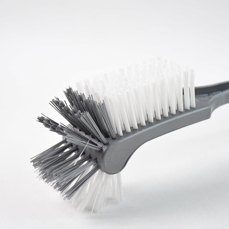 Long handle toilet cleaning brush shown angled for under-rim reach