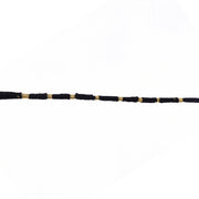 Red Mauli rakhi with gold and pearl details for festival