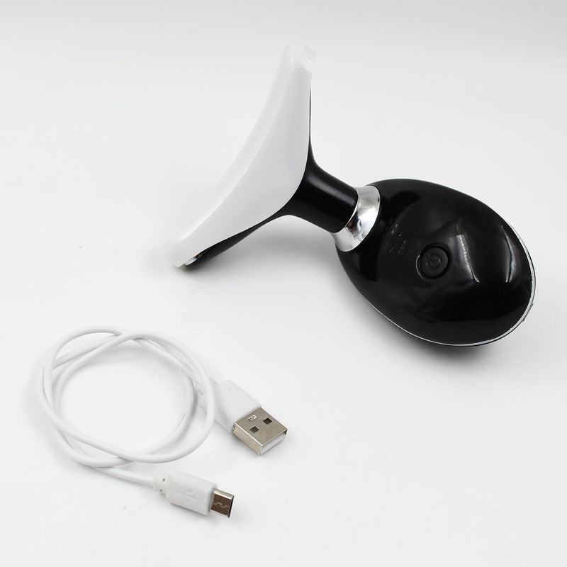 The portable Neck Face Massager shown with its USB charging cable.