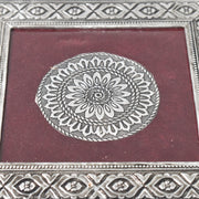 Top view of the silver pooja chowki, showcasing its exquisite mandala pattern and finish.